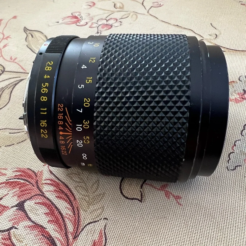 Yus automatic 1:2.8 f=135 mm 55 lens